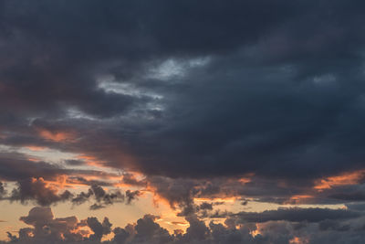 Low angle view of dramatic sky during sunset