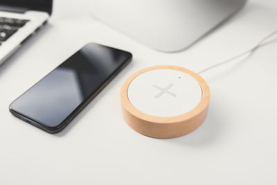 Close-up of mobile phone on table