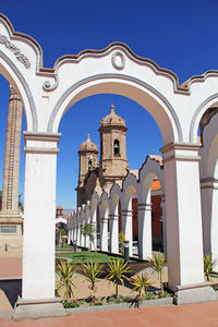 Low angle view of a building against clear blue sky