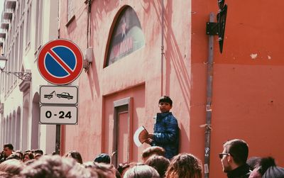 Group of people in front of building