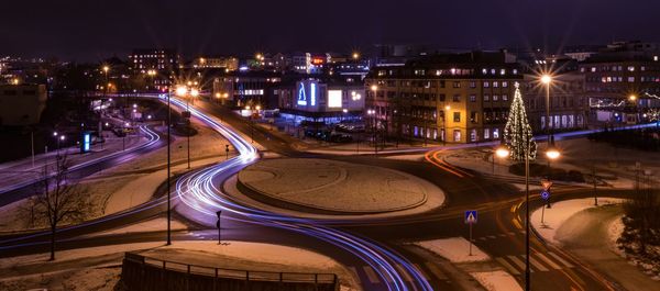 High angle view of road in city at night