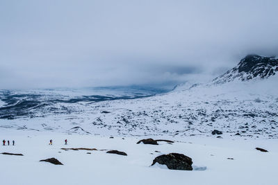 Scenic view of sea against sky during winter