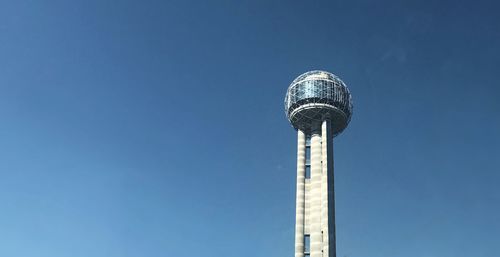 Low angle view of reunion tower and building against clear sky in dallas, tx