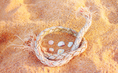 High angle view of stuffed toy on sand