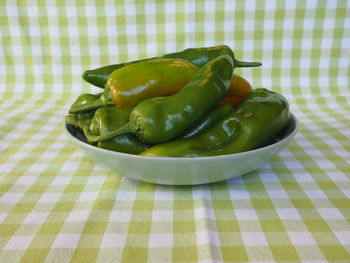 Close-up of bell peppers in bowl on table