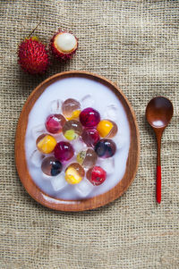 Directly above shot of fruit jelly dessert served in plate on table