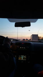 People on road at sunset