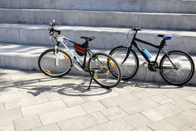Bicycles parked on footpath