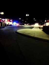 Cars on road at night