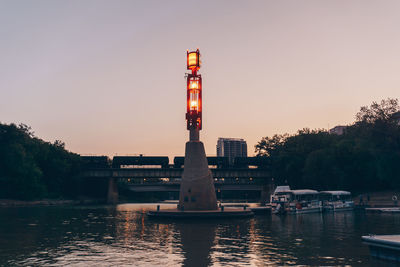 View of illuminated city at sunset