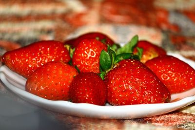 Close-up of strawberries in bowl on table
