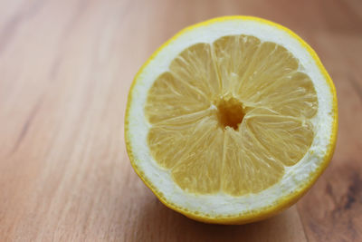 Close-up of lemon on table