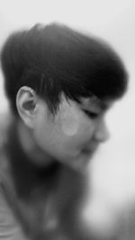 Close-up portrait of boy looking away