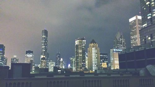 Illuminated cityscape at night