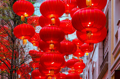 Low angle view of red lanterns hanging