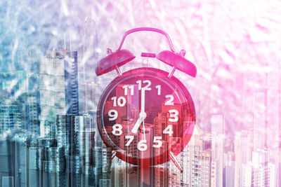 Digital composite image of clock on glass