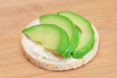 Close-up of avocado on table