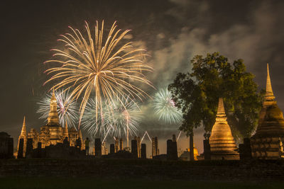 Firework display at night