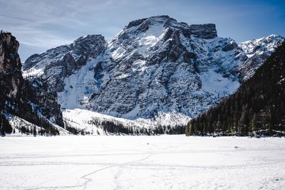 Snow covered mountains against sky