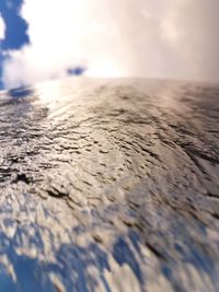 Surface level of river against sky