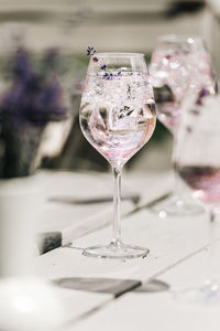 Close-up of wineglass on table