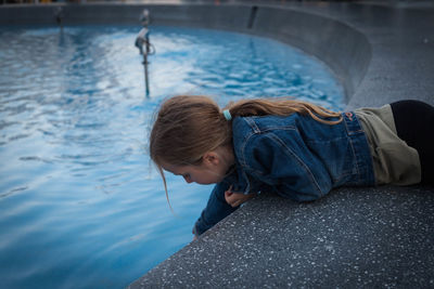 High angle portrait of cute girl in water