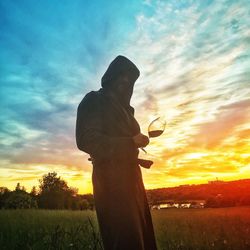 Scenic view of landscape at sunset