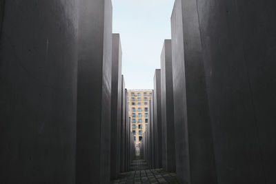 Alley amidst buildings in city