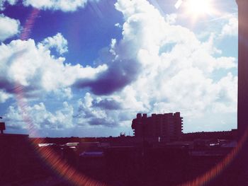 Built structure against cloudy sky