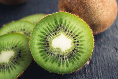 Close-up of kiwi fruits on table