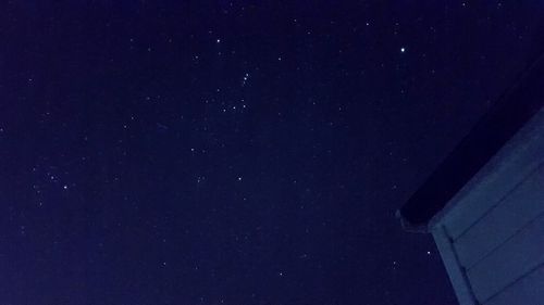 Low angle view of building against sky at night