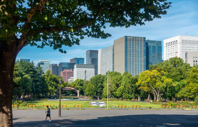 Buildings in city against sky