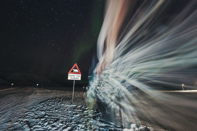 Low angle view of illuminated light