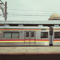 Train at railroad station in city