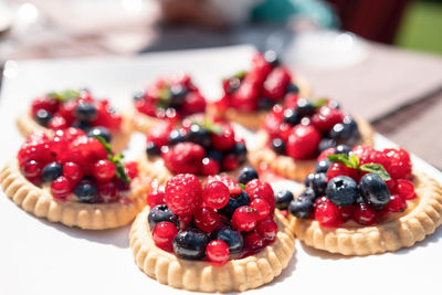 Close-up of berry tarts on table
