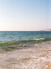 Scenic view of sea against clear sky