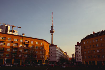 Buildings in city against sky