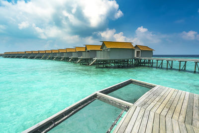Resort by sea against sky