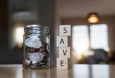 Close-up of coins on table