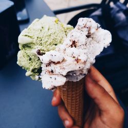 Midsection of person holding ice cream