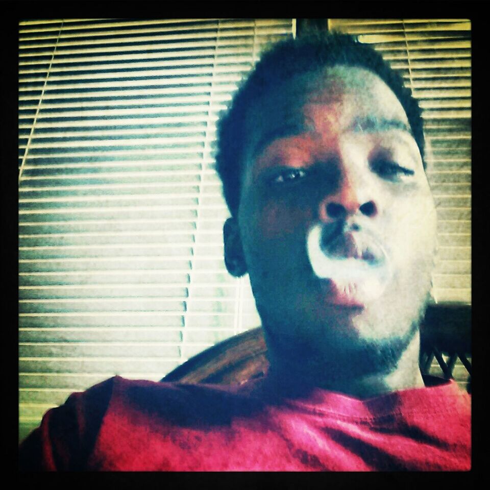 looking at camera, portrait, transfer print, indoors, auto post production filter, front view, headshot, person, close-up, home interior, young adult, young men, human face, head and shoulders, lifestyles, wall - building feature, contemplation