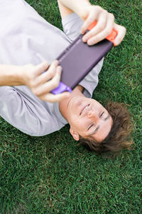 Midsection of woman using mobile phone