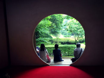 People walking in corridor of building