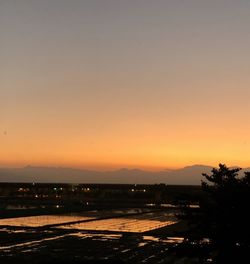 Scenic view of silhouette landscape against sky during sunset