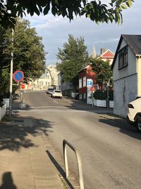 Street by buildings in city