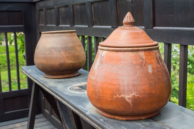 Close-up view of pots on table