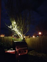 Illuminated street light at night