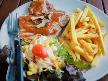 Close-up of food served on table