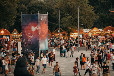 People walking on street in city