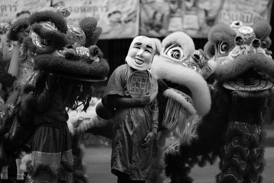 Close-up of man wearing mask during event